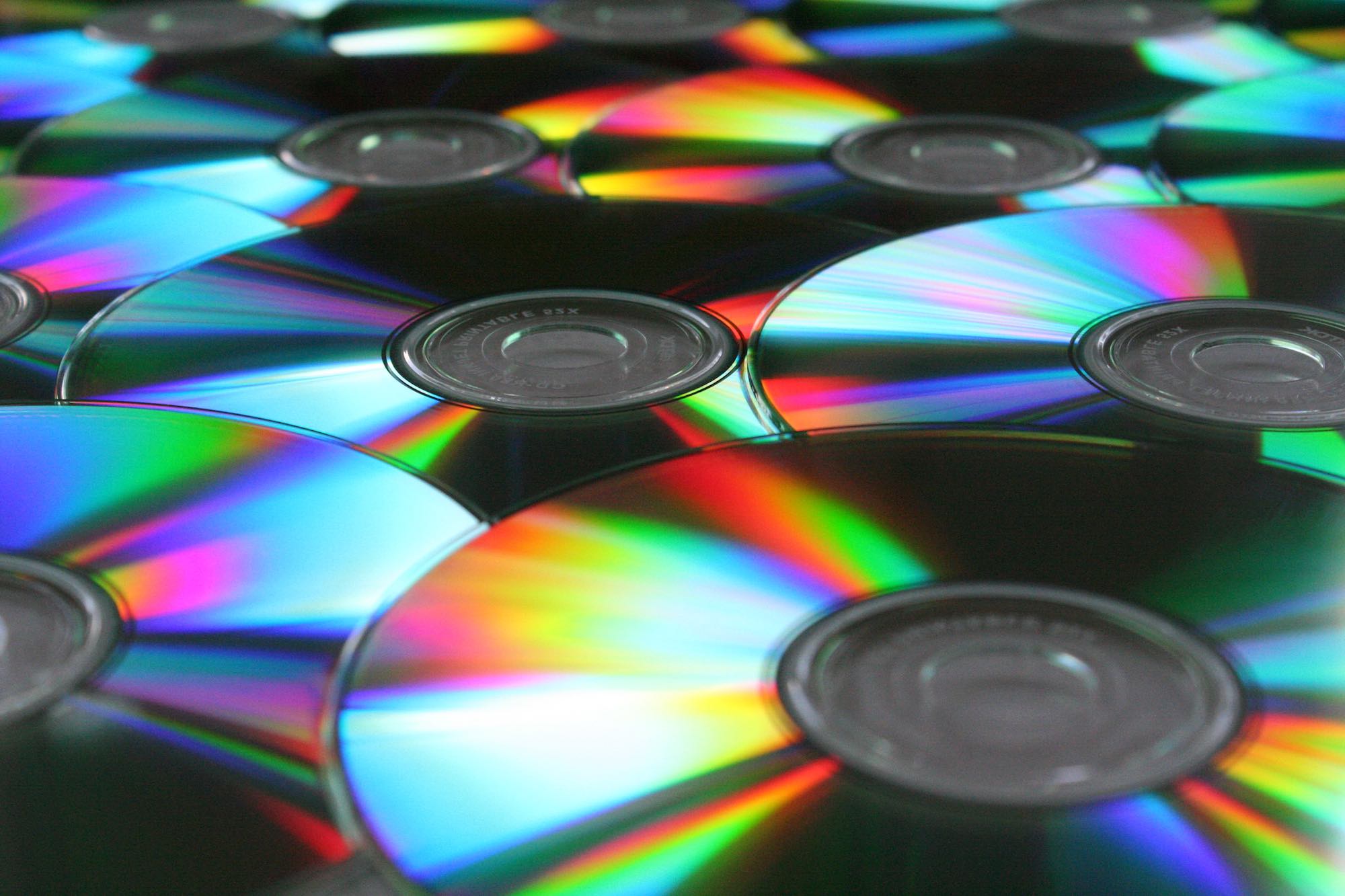a variety of colorful cds