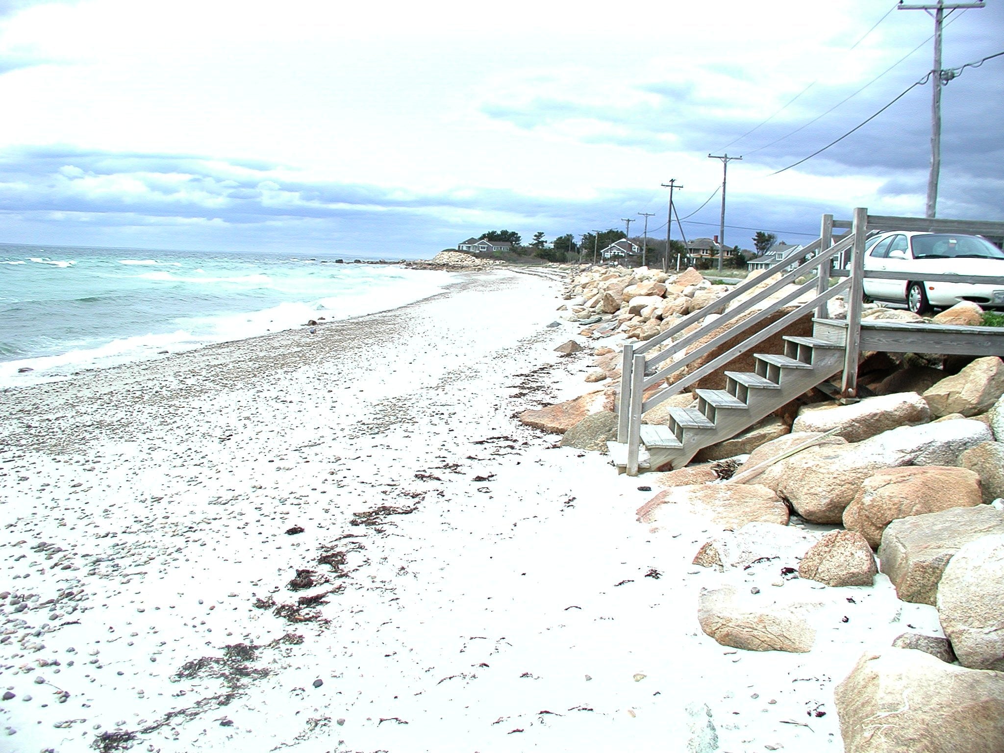 a small set of stairs leading down to the beach