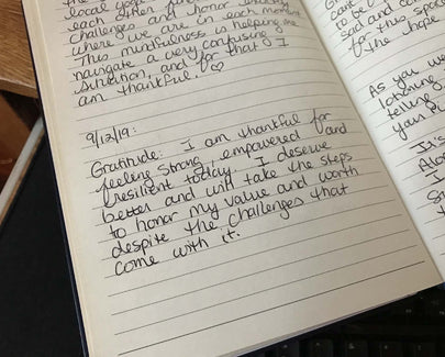 writing in a notebook
