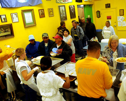 US Navy 090806-N-6220J-004 Sailors and Navy Delayed Entry Program members serve breakfast to homeless men and women at Dorothy's Soup Kitchen