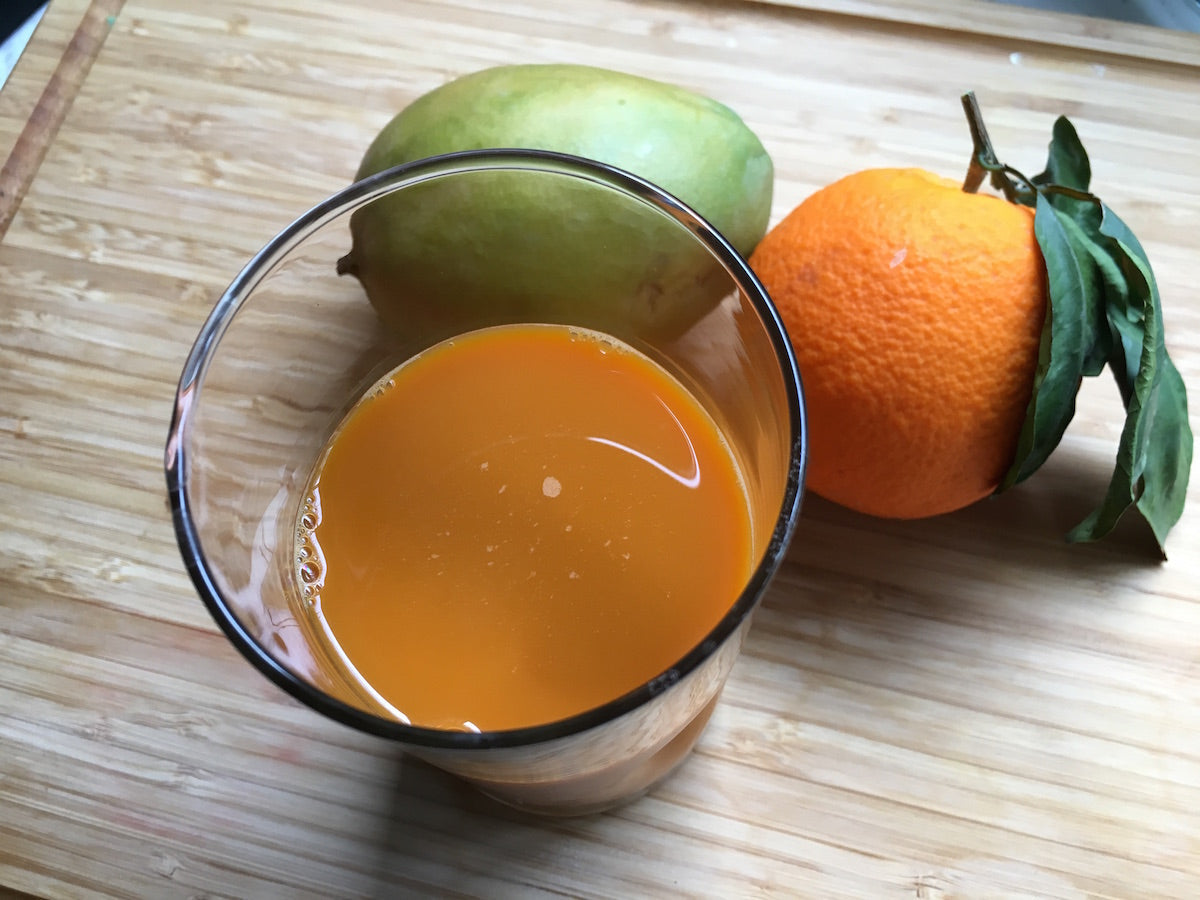 orange juice with orange and mango