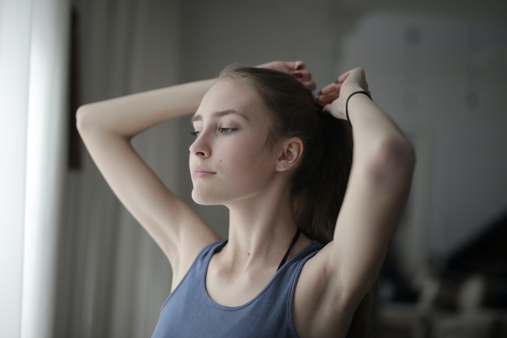 Woman in Blue Tank Top