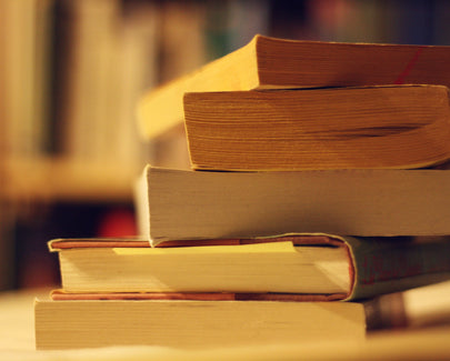books stacked on top of one another