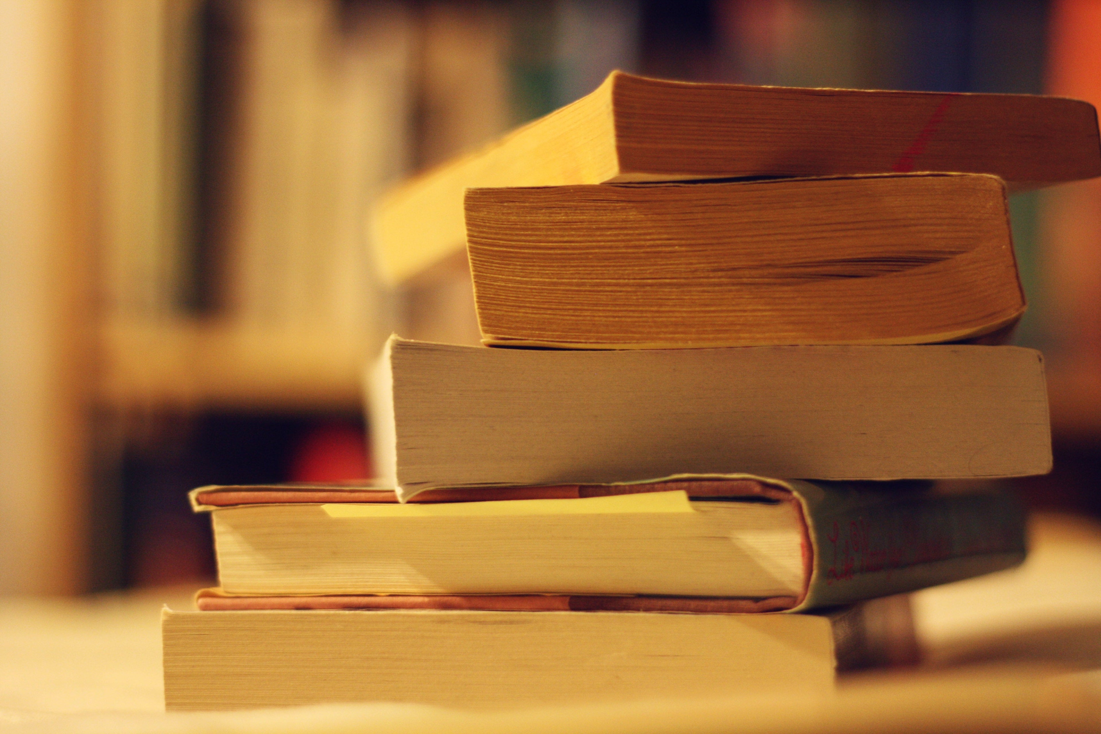 books stacked on top of one another