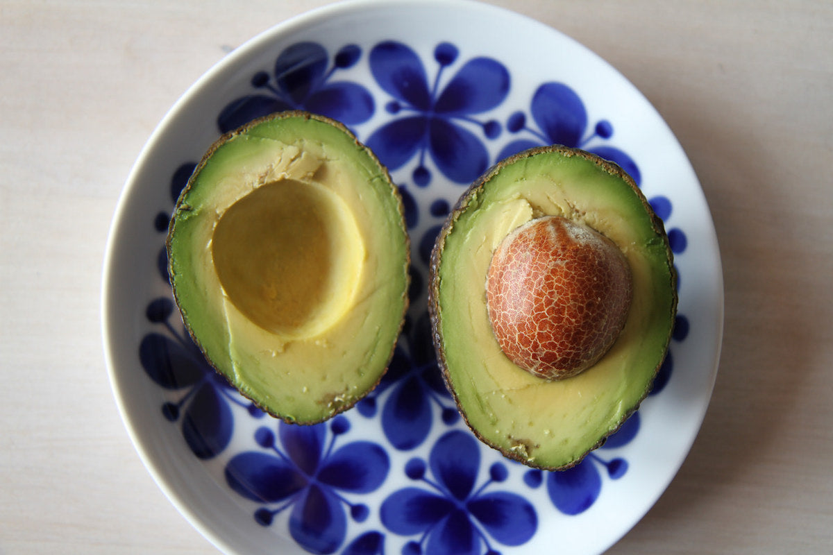avocado open with pit
