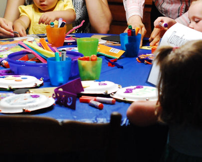kids around the table crafting