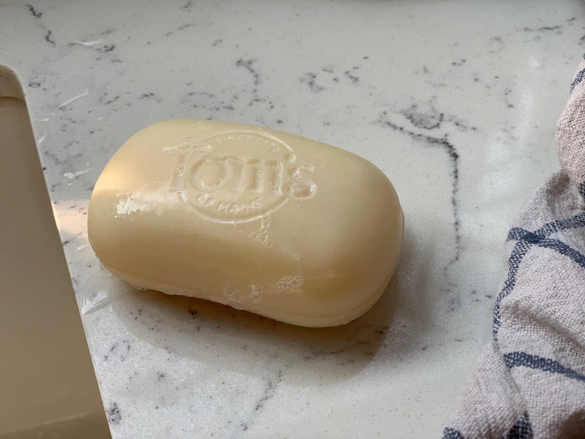 toms natural soap on counter